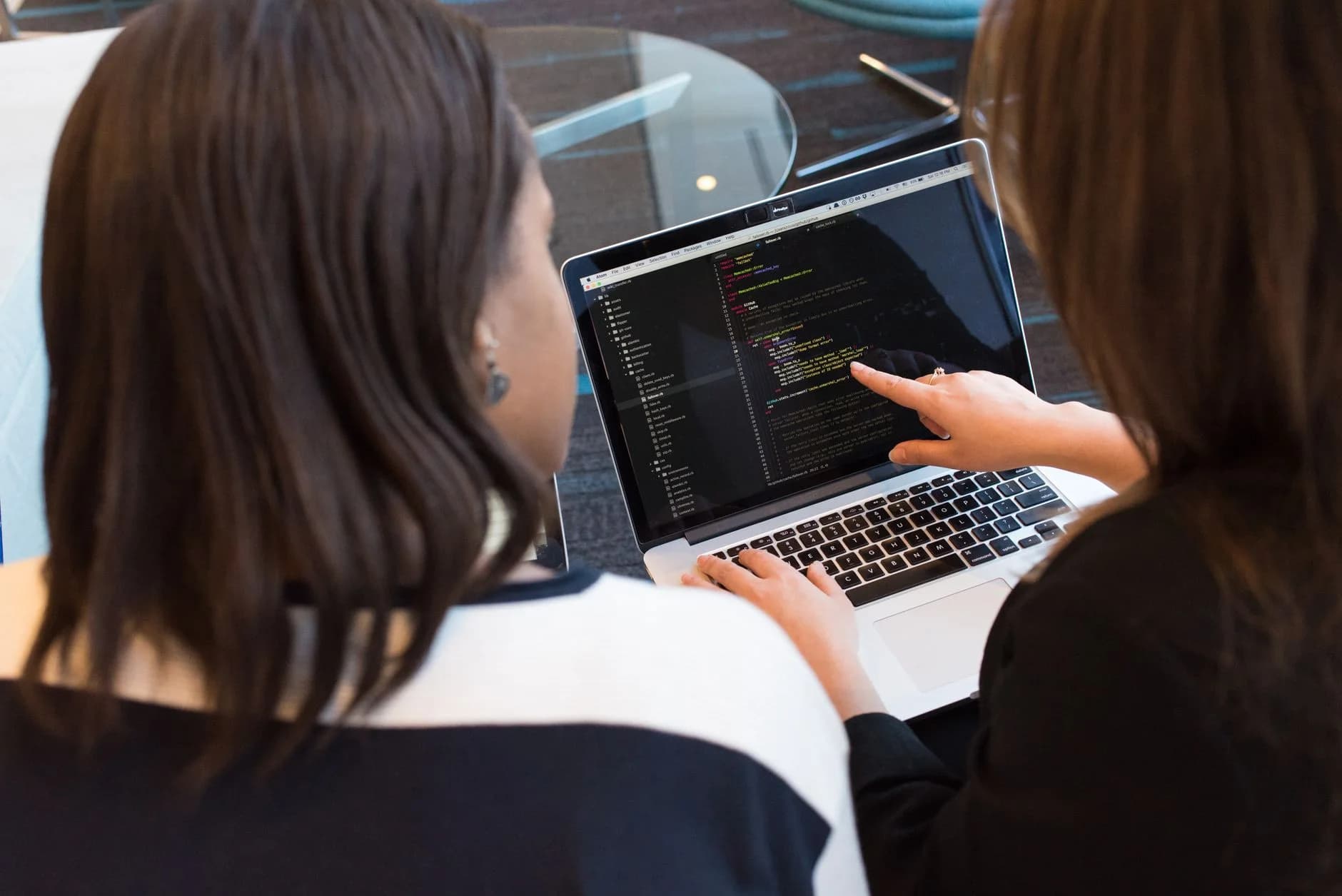 Two developers reviewing code together
