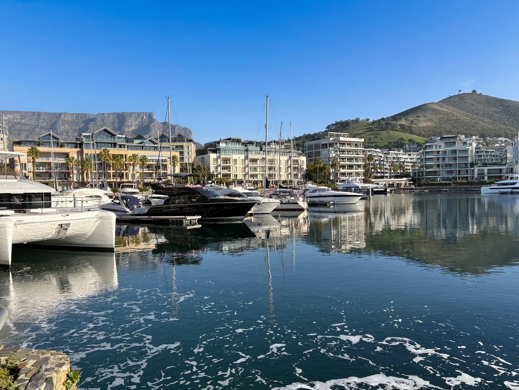 Boats in Cape Town marina with Table Mountain in background